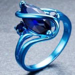 Голубое золото кольцо с камнем